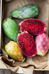 Directly above shot of Prickly pears  in a crate, one open