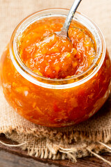 Closeup of orange jam in a jar