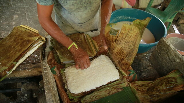 conde, bahia, brazil - october 8, 2021: preparation of tapica beiju with coconut in the rural area of ​​the municipality of Conde, north coast of Bahia.