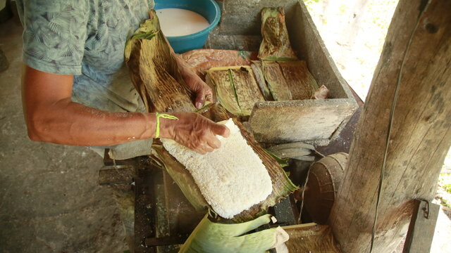 conde, bahia, brazil - october 8, 2021: preparation of tapica beiju with coconut in the rural area of ​​the municipality of Conde, north coast of Bahia.