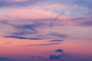 Obraz premium Beautiful colorful sunset sky. The sun behind the colored clouds.