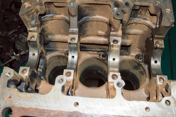 View of the old engine cylinder block from the installation site of the crankshaft