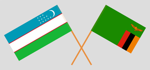 Crossed flags of Uzbekistan and the Republic of Zambia. Official colors. Correct proportion