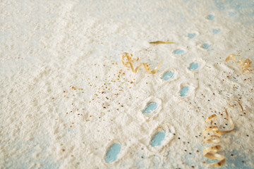 Santa Claus footprints in the snow. Winter holiday creative idea. Christmas New Year background.