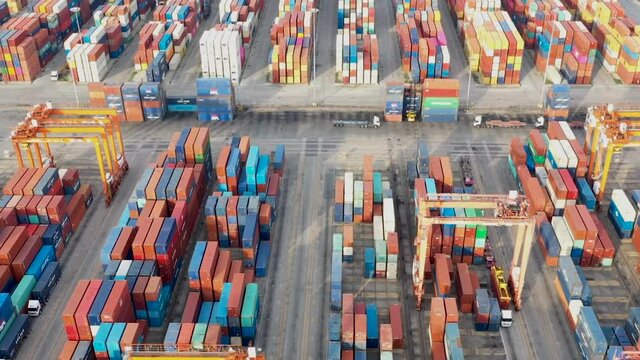 Time lapse,Aerial view At  container ship terminal,Industrial business import and export Logistics and Supply Chain