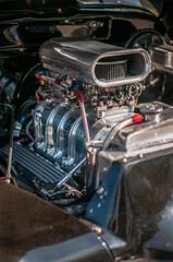 Supercharged v8 engine of a classic car, Surrey, UK.