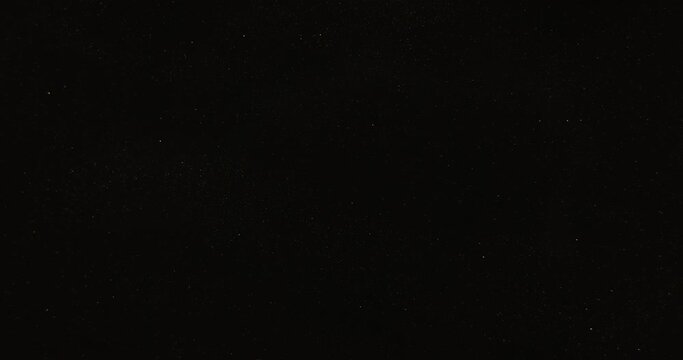 Black Glitter Background is a stock footage of paint that flows beautifully across the surface. This 4096x2160 (4K) video clip will look amazing in any video project. Use it as a background.