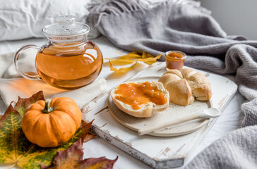 breakfast in bed bread and butter, apricot jam and tee