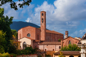 Lucca charming historical center. View of the city old skyline with medieval towers and St Francis...