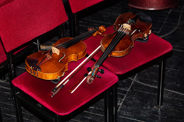violns on chairs during interval