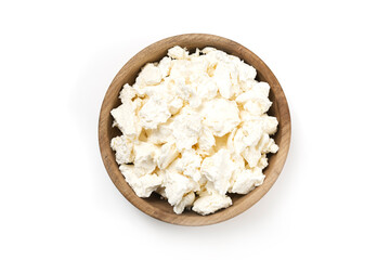 Cottage curd cheese in a wooden bowl isolated on a white background. Homemade milk food.
