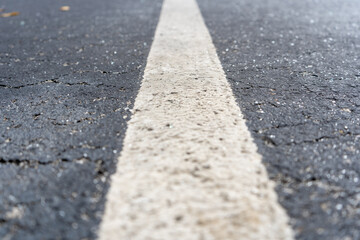 Close Up of Rough Texture Road Lane Marking