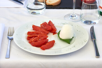 Caprese salad with mozzarella and tomato