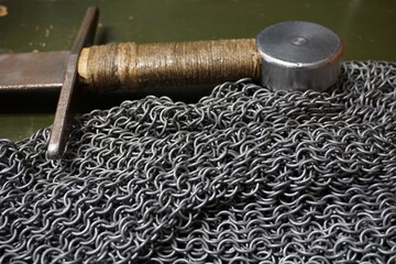 gray steel ringlet, light armor, homemade sword hilt