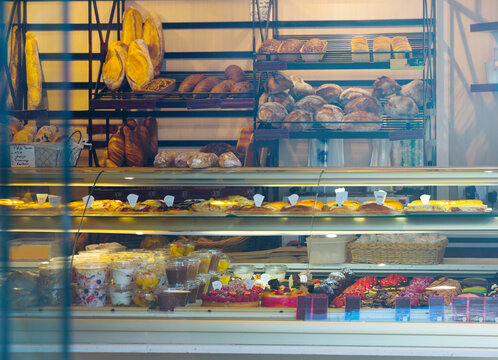 Confectionery shop window - cakes, pastries, desserts. High quality photo