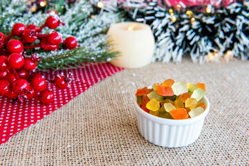 Obraz na płótnie Canvas Candied fruit and raisins on a Christmas table