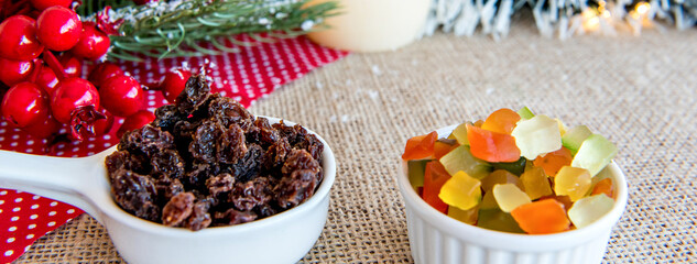 Candied fruit and raisins on a Christmas table outdoor format.