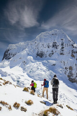 Trekking in the snow in the mountain of the Peruvian Andes Cordillera Huayhuash Lima 