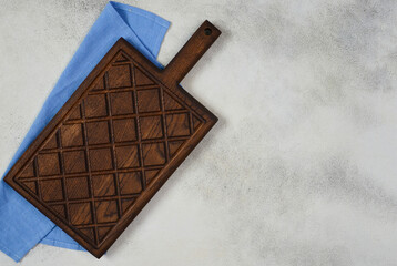 empty wooden old textured cutting board on concrete table for desidn , mock up for copy space text, food concep and table setting blank