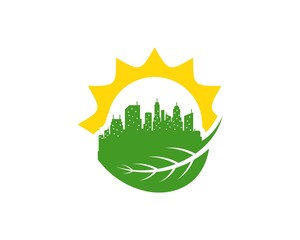 Nature leaf with city building and sun behind