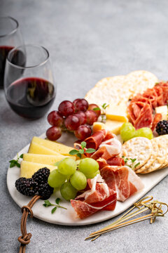 Summer Charcuterie Board With Cheese, Meat And Fruit