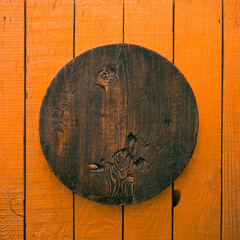 wooden plate, orange background