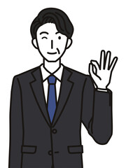 オッケーポーズの中年男性社員