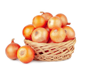 Onions in basket isolated on a white background