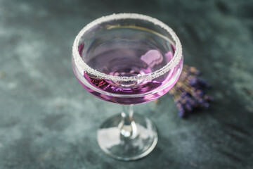 Purple soft lavender cocktail on the rustic background. Selective focus. Shallow depth of field.