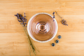 Purple soft lavender cocktail on the rustic background. Selective focus. Shallow depth of field.