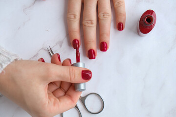 Professional trendy Hardware Manicure. Procedure for the preparation of nails. Red autumn fall...