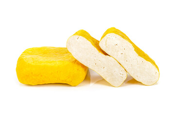 yellow tofu isolated on white background. fresh yellow tofu isolated on white background