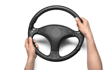 Man holding modern steering wheel on white background