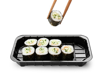 Set of delicious sushi rolls on white background