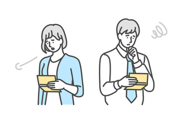 通帳の預金残高を見て不安になっている男女