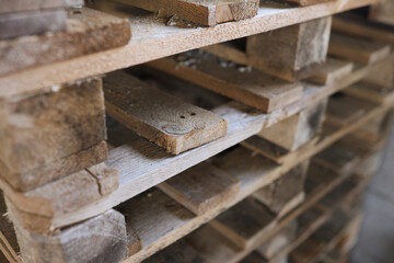 Construction wooden pallets are stacked together closeup