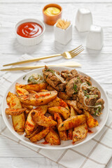 Grilled Pork Shoulder Steaks with potato wedges