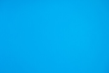 Blue paper background, top view