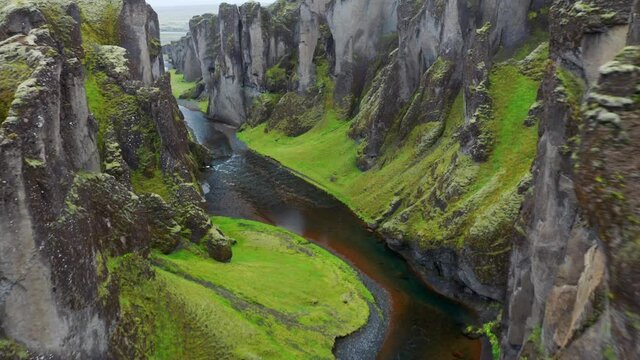 Unique Rugged Landscape Of Fja&eth;r&aacute;rglj&uacute;fur Canyon Covered By Beautiful Green Moss, Located In Southern Iceland - aerial shot