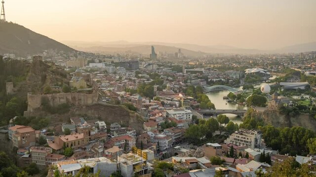 Day to night Time Lapse video of Tbilisi cityscape skyline, Georgia