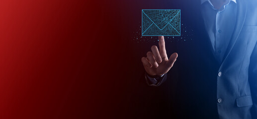 Businessman hand holding letter icon,email icons.Contact us by newsletter email and protect your...