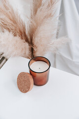 Brown candle with Scandinavian mood and lifestyle, add your own logo and style.