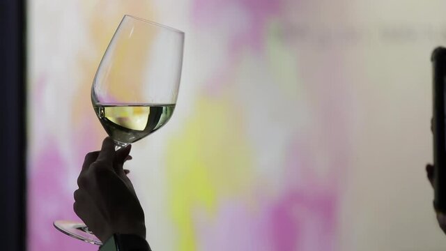 Natural white wine tasting, dim cellar light