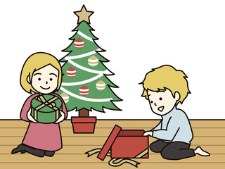 Obraz na płótnie Canvas クリスマスプレゼントをもらう金髪の男の子と女の子
