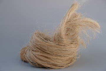 Natural flax or hemp, tow, close-up. Growing demand for natural fibers.