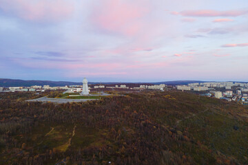 Fototapeta na wymiar Aerial view panorama of city monument Defenders of Soviet Arctic Alyosha .