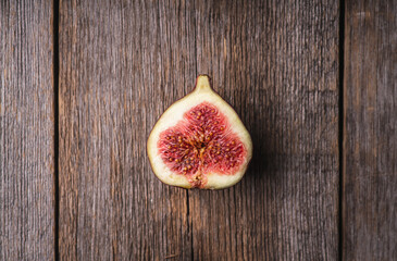 Freshly harvested ripe fig on the colorful background. Selective focus. Shallow depth of field.