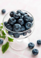 Blueberries on tile background