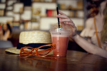 beautiful woman reading a book in a cafe communication