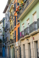 Obraz premium Street, Colorful building facade in the old town of Pamplona, ​​Navarra, Spain. Streets where San Fermín is celebrated